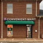 6 Twelve Convenience, brick building with green awning